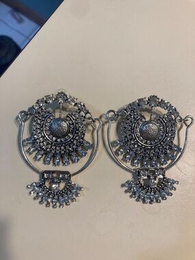 Silver toned with faux rhinestone large dangle earrings